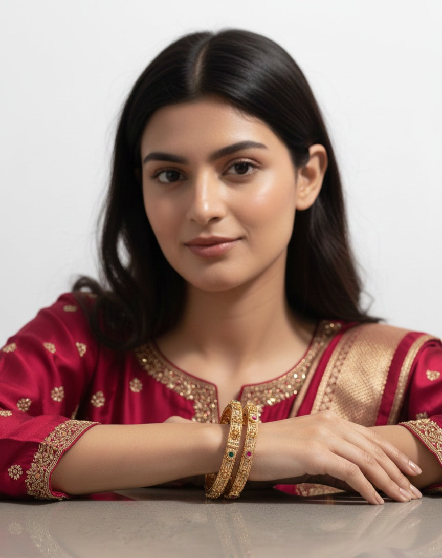 Itrani Antique Gold Brass Bangles with Multicolor Stones and Swastik Design – Traditional Festive Jewelry