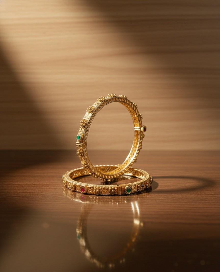 Itrani Antique Gold Brass Bangles with Multicolor Stones and Swastik Design – Traditional Festive Jewelry