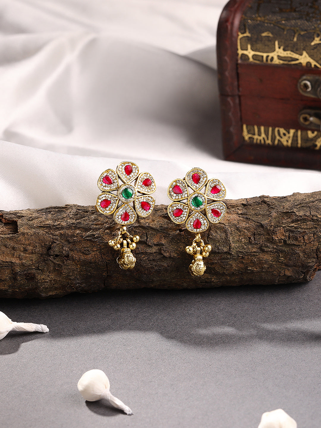 Itrani Ruby Bloom Brass Stud Earrings with Jhumka Drop – Red & Green Stone Floral Design for Festive Wear