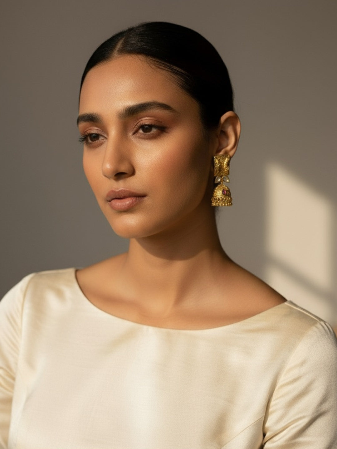 Itrani Gold-Polish finishing Synthetic Kundan & Ruby Drop Jhumka Earrings | Handcrafted Royal Design