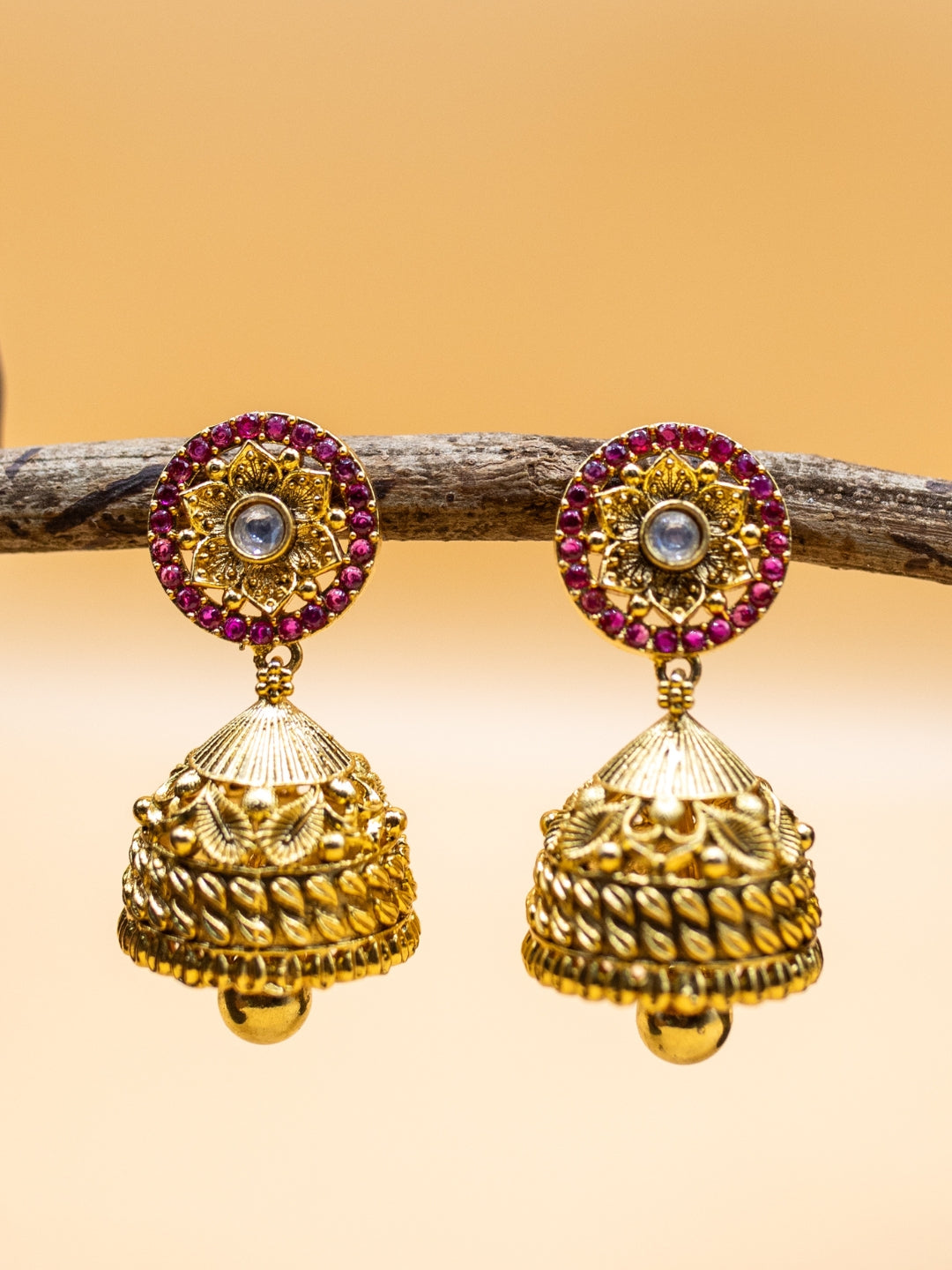 Itrani Gold-Polish finishing Ruby Synthetic Stone Temple Jhumka Earrings | Handcrafted Traditional Design