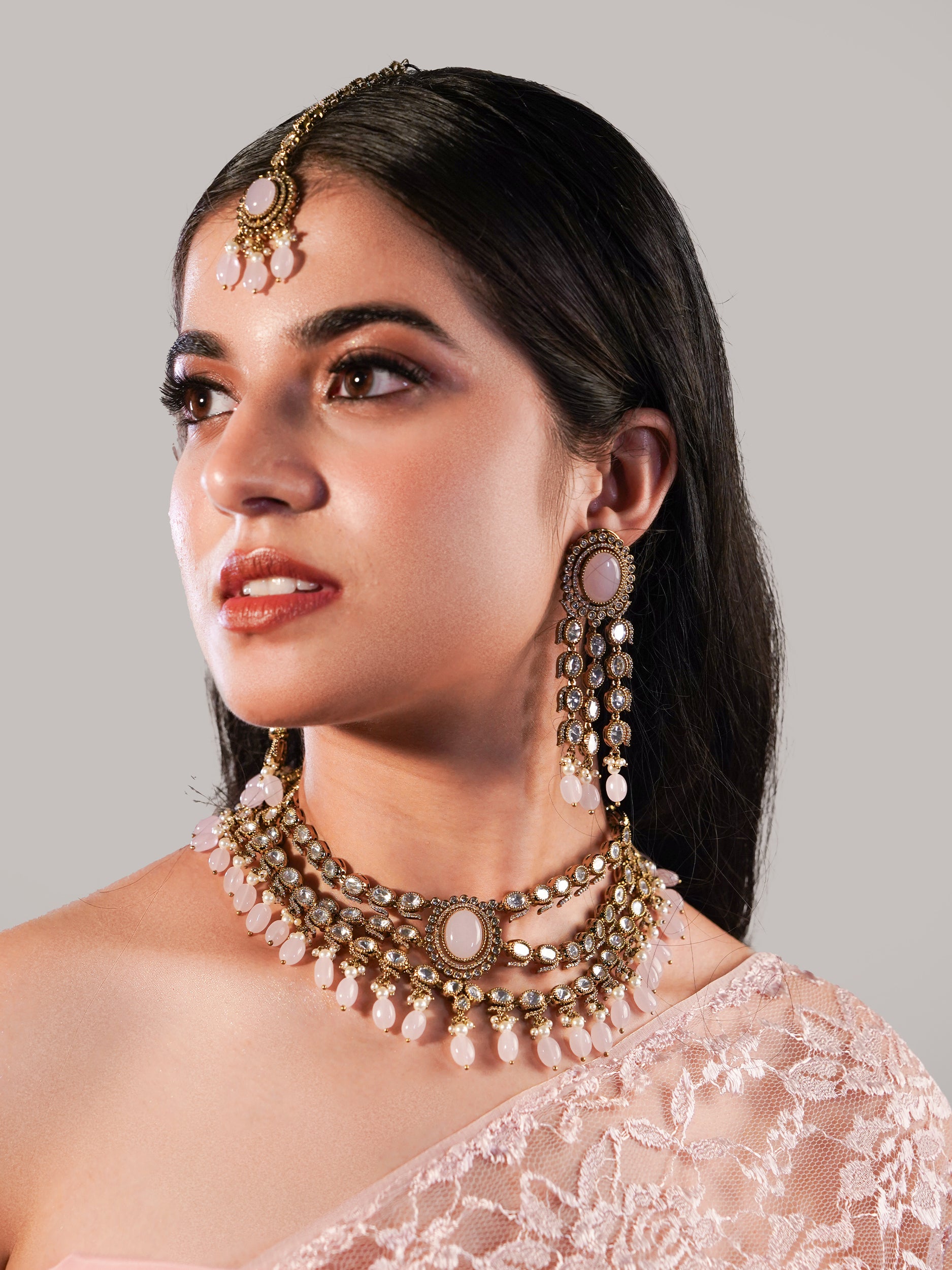 Itrani three layers Clear Polki Stone with Pink Drops Necklace Set – Traditional Brass Jewelry with Earrings & Maang Tikka