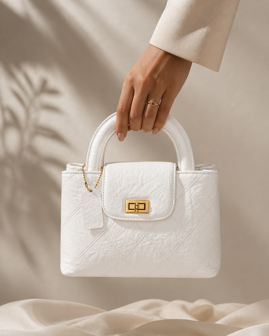 Ivory Luxe Quilted Top Handle Bag