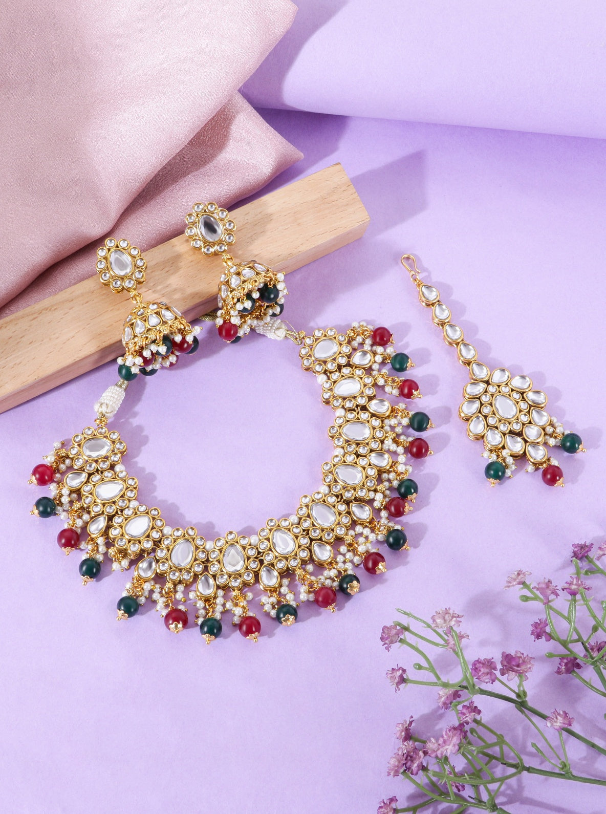 Itrani Royal Heritage Kundan Necklace Set – Red & Green Beaded Bridal Jewelry with Maang Tikka (Anti-Tarnish Brass)