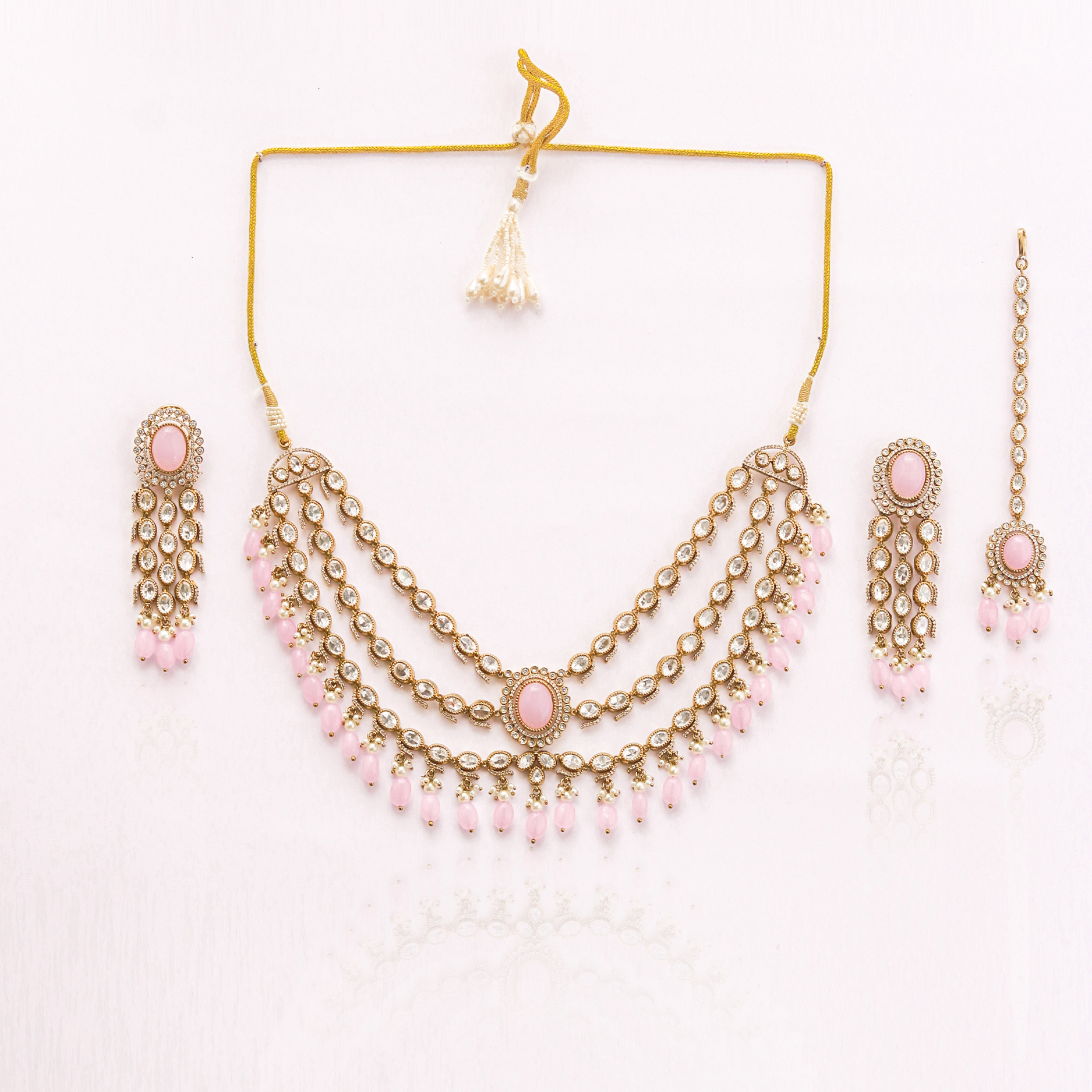 Itrani three layers Clear Polki Stone with Pink Drops Necklace Set – Traditional Brass Jewelry with Earrings & Maang Tikka