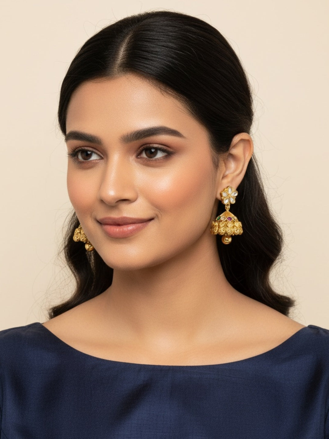 Itrani Gold-Polish finishing  Kundan Floral Jhumka Earrings | Ruby & Emerald Accent Rajwadi Design